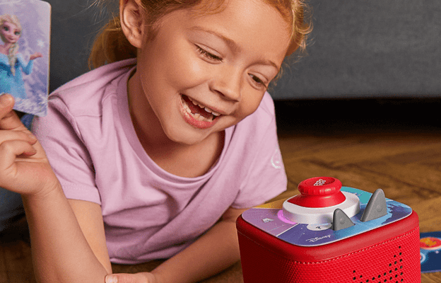 child playing Disney Tonieplay Game with red Toniebox 2