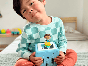 Child Playing With Favorite Classics: The Wonderful Wizard Of Oz Tonie