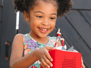 Child Playing With Dc: Wonder Woman Tonie