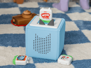 Child Playing With Wondery Kids Tonies Audio Figurine And Toniebox 2