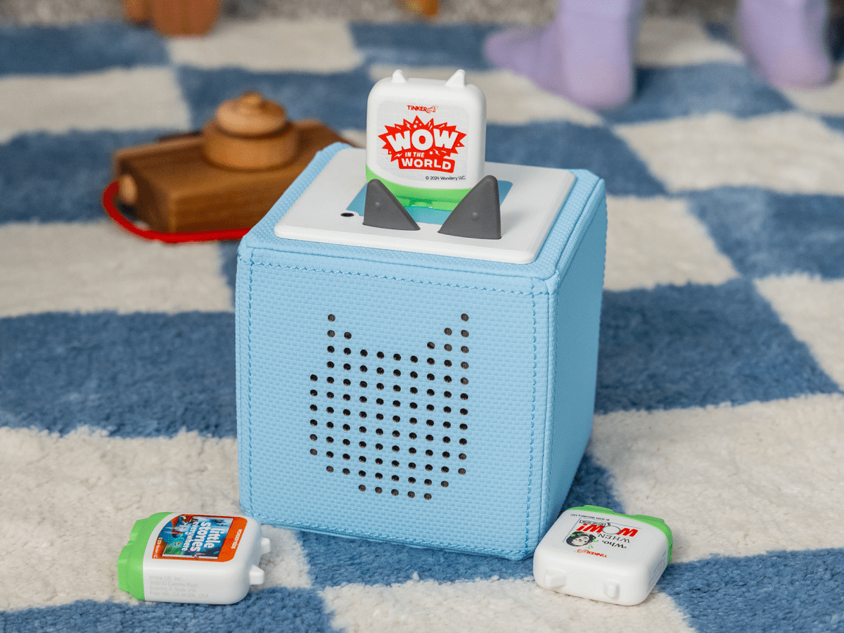 Child Playing With Wondery Kids Tonies Audio Figurine And Toniebox 2