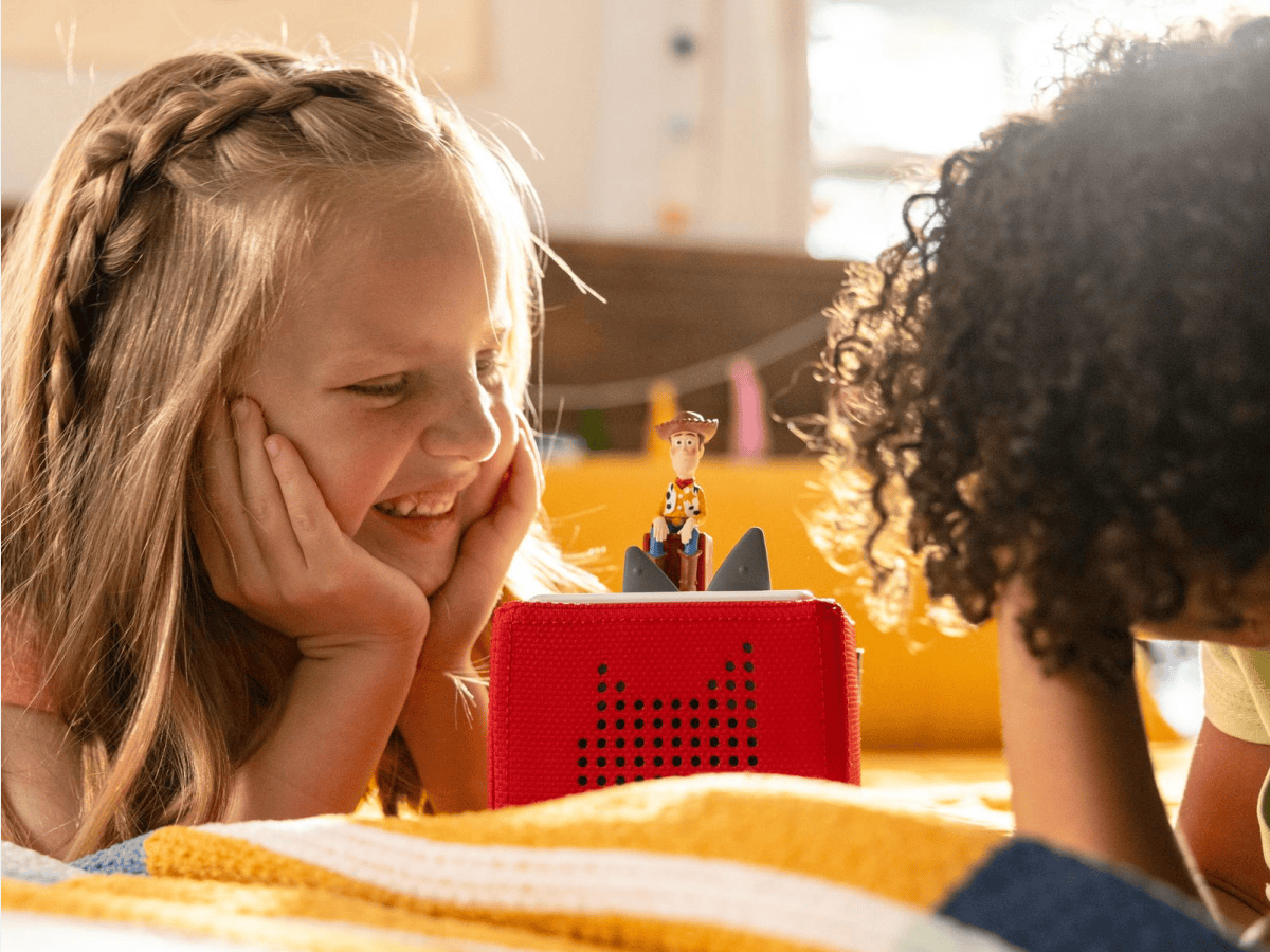 Child Playing With Toy Story Spanish Tonie  Audio Figurine And Toniebox 2