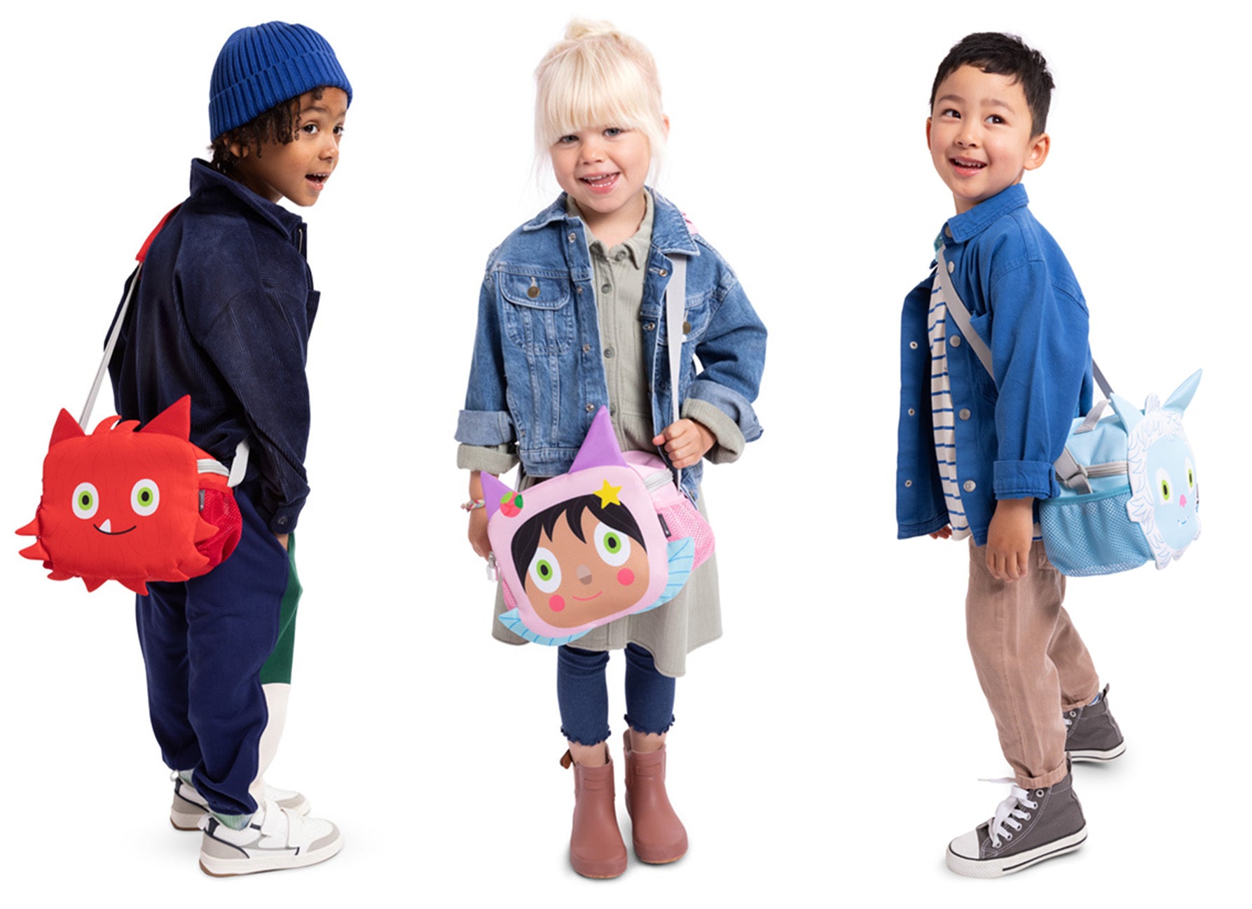 Three children with Character Bags over their shoulders