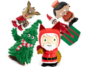 Set of Christmas-themed figurines including a Santa Claus, reindeer, and tree on a white background