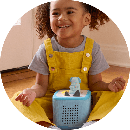 girl learning about meditation with a Tonie and blue Toniebox 2