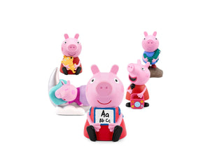 Set of Peppa Pig figurines on a white background