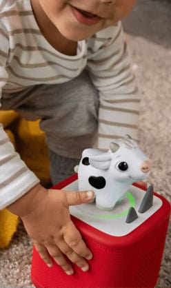 child playing with my first tonies cow