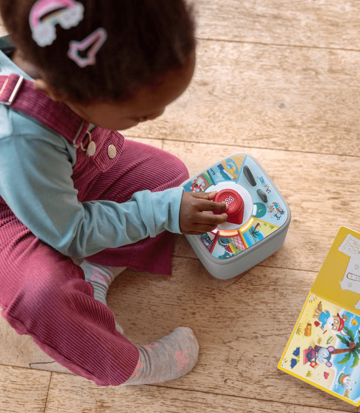 child playing lalalinos tonieplay play game with tonieplay controller and sky blue toniebox 2