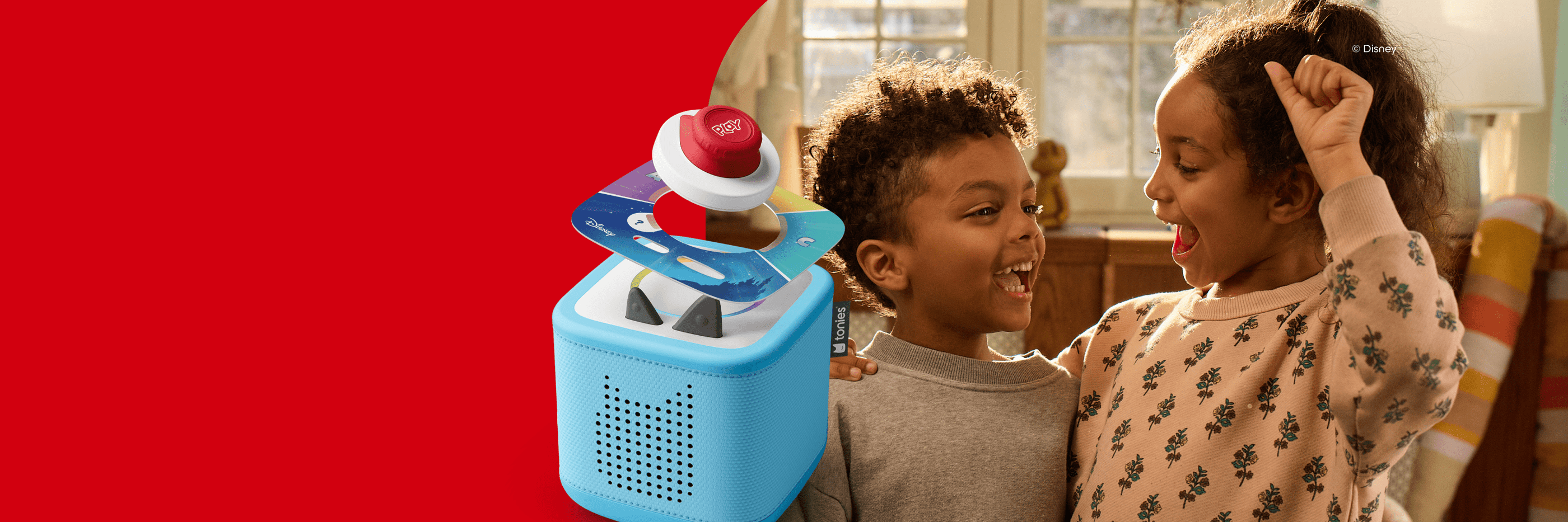 two children getting excited to play the Disney Tonieplay Game on the sky blue Toniebox 2