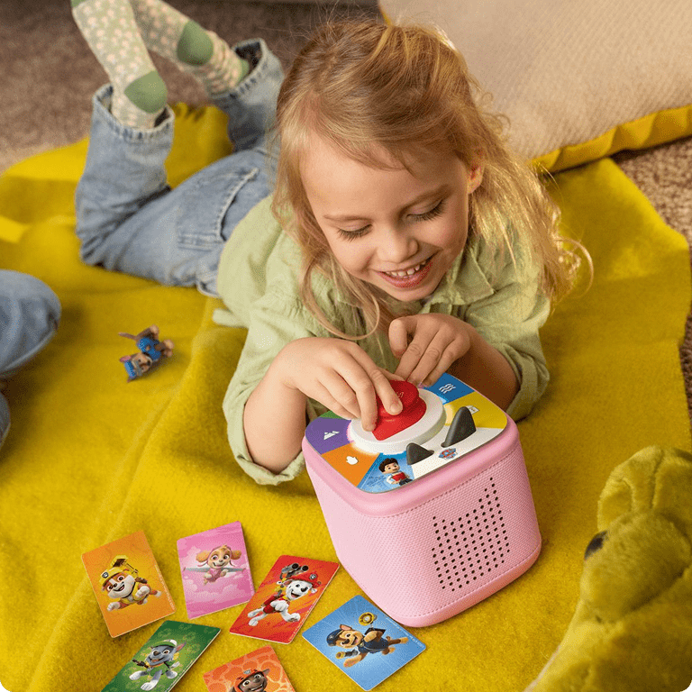 child playing PAW Patrol Tonieplay game on a cloud pink Toniebox 2