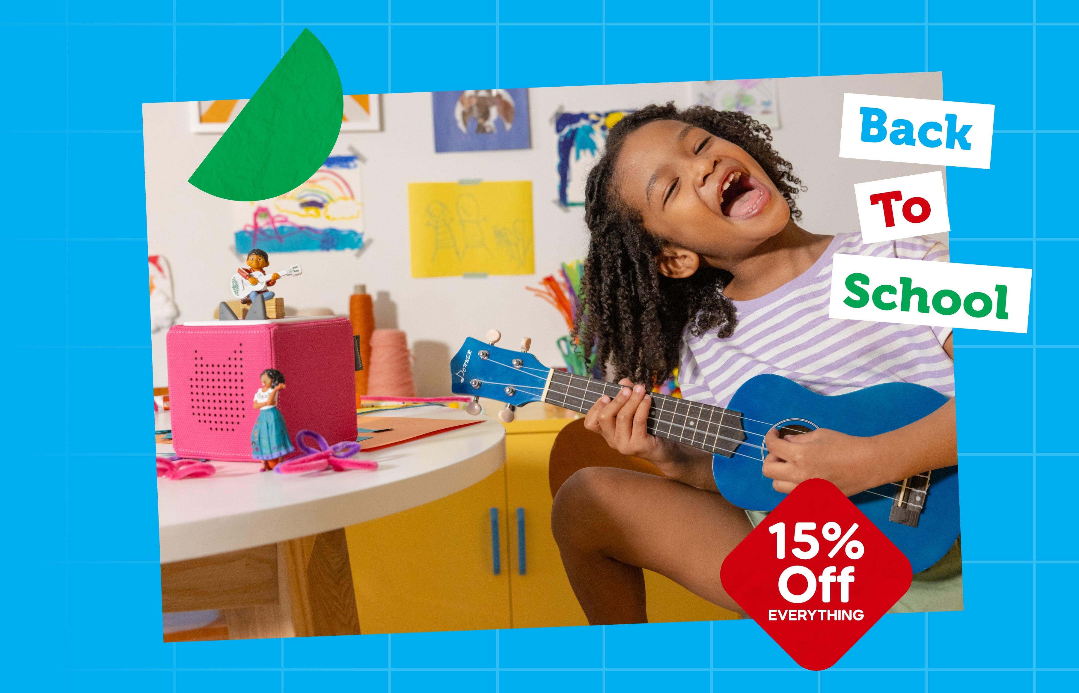 A girl listening to her pink Toniebox to promote our Back to School sale with 15% off sitewide.