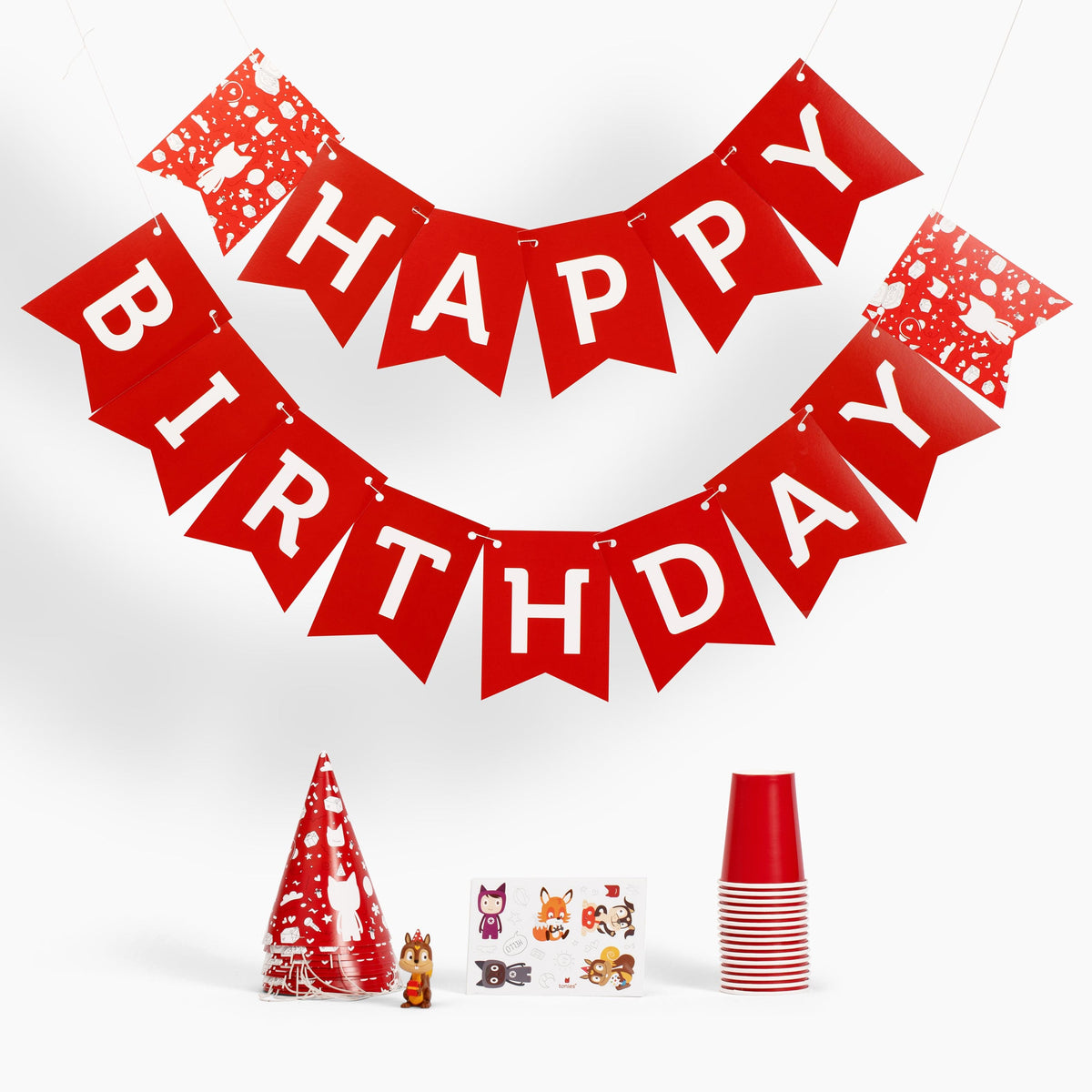 Birthday Box items including banner, hats, stickers, cups and Celebration Songs Tonie